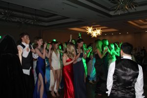 Students dance to the music at prom. (Photo by Emily Johnson)