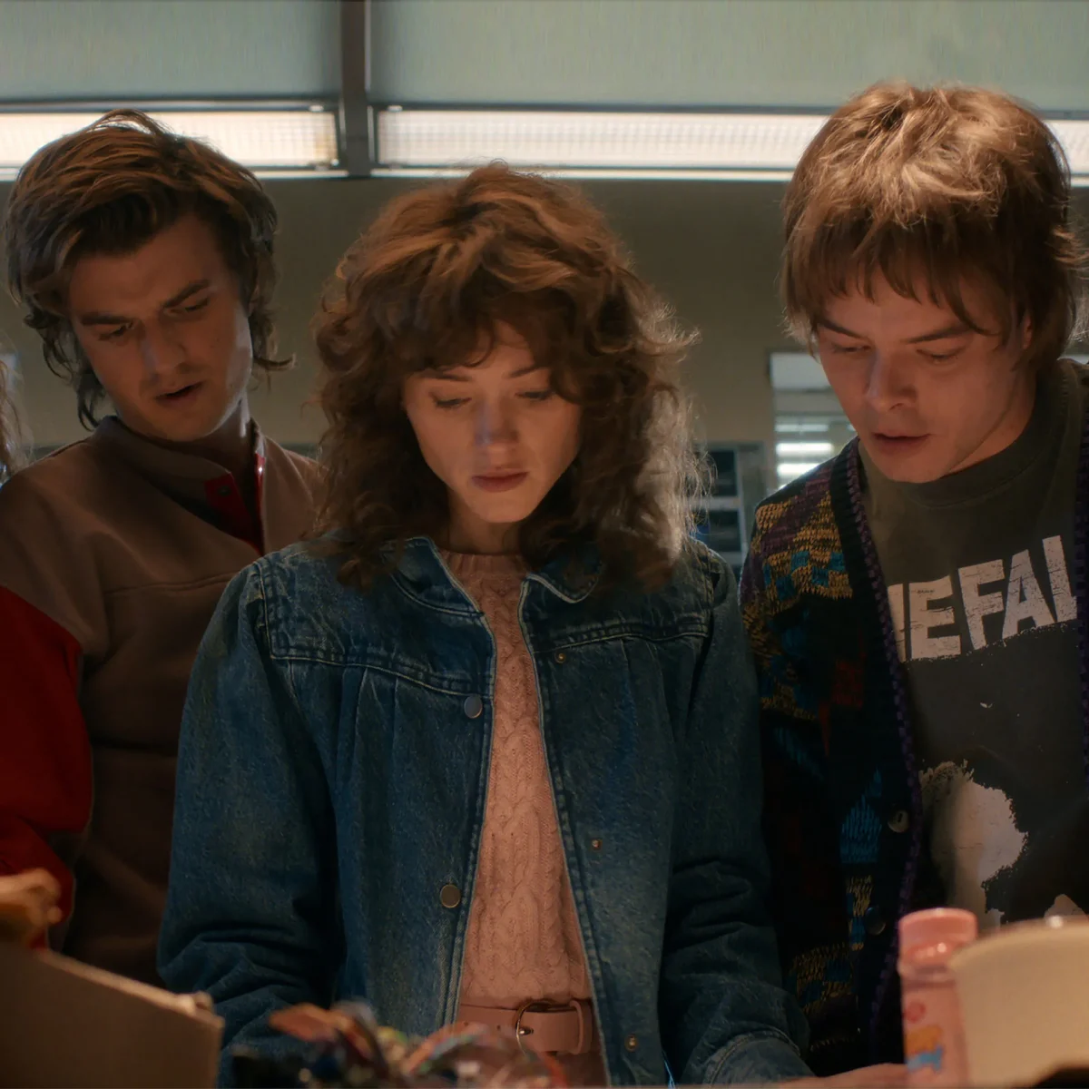  Steve Harrington and Jonathan Byers surrounding Nancy Wheeler. (Photo via Glamor)