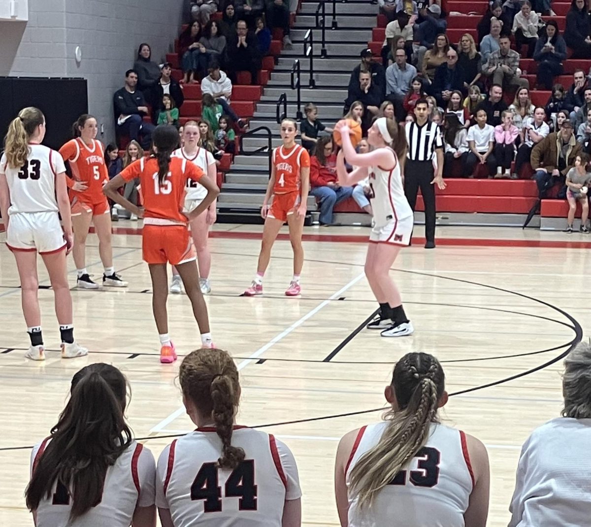  Sophomore Bridget Creed shoots a free throw late in the fourth quarter. (Photo by Mattia Aramonte)