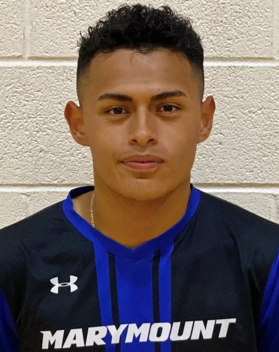 Coach Ronald Cruz-Rivas (Photo via Marymount University)
