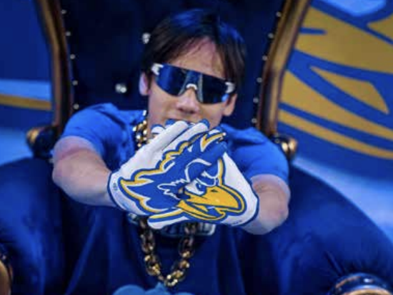 Ryan Southern poses surrounded by Delaware Merchandise. (Photo courtesy of Ryan Southern)