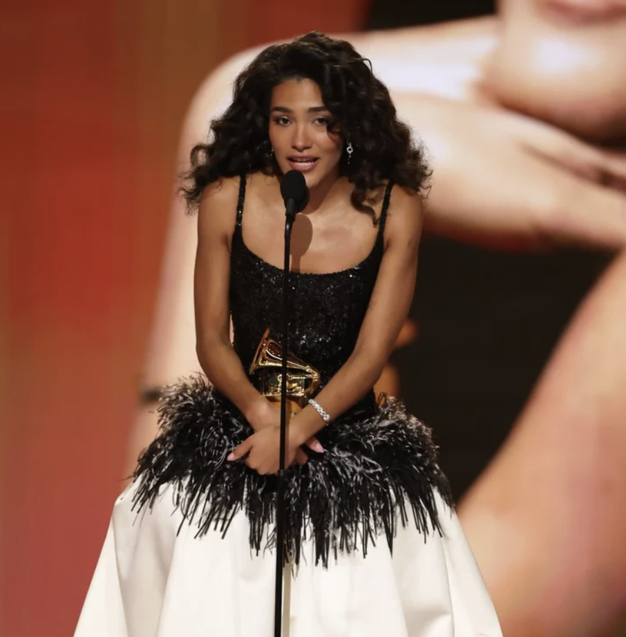 Olivia Dean delivers a speech after winning the Grammy award for Best New Artist. (Photo via Los Angeles Times)