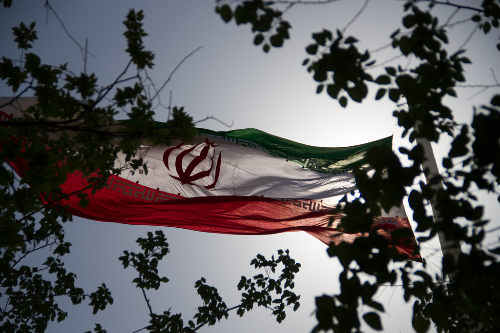  Protestors rally with Iran flags across the Middle East. (Photo via Flickr)