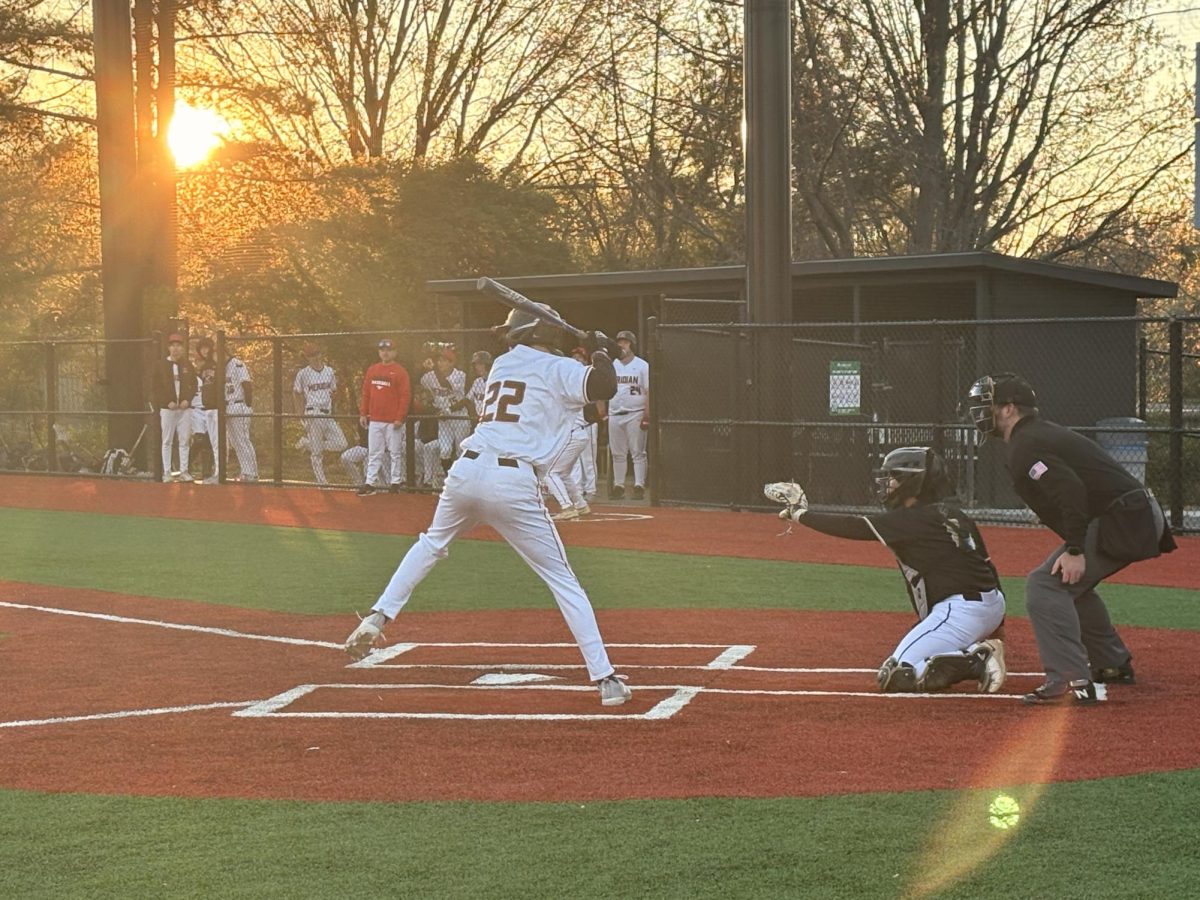  Junior Jason Wattles (#22) looks for a hit early in the game. (Photo by Dinos Simcox)