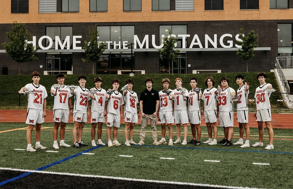 The seniors on Mustang lacrosse pose together after a win.