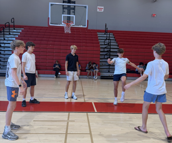 Mustangs playing hacky sack during their free time.
