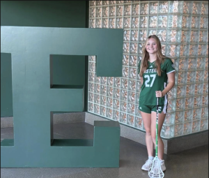 Junior Hannah Rosenbusch poses near the Eastern Michigan “E.”